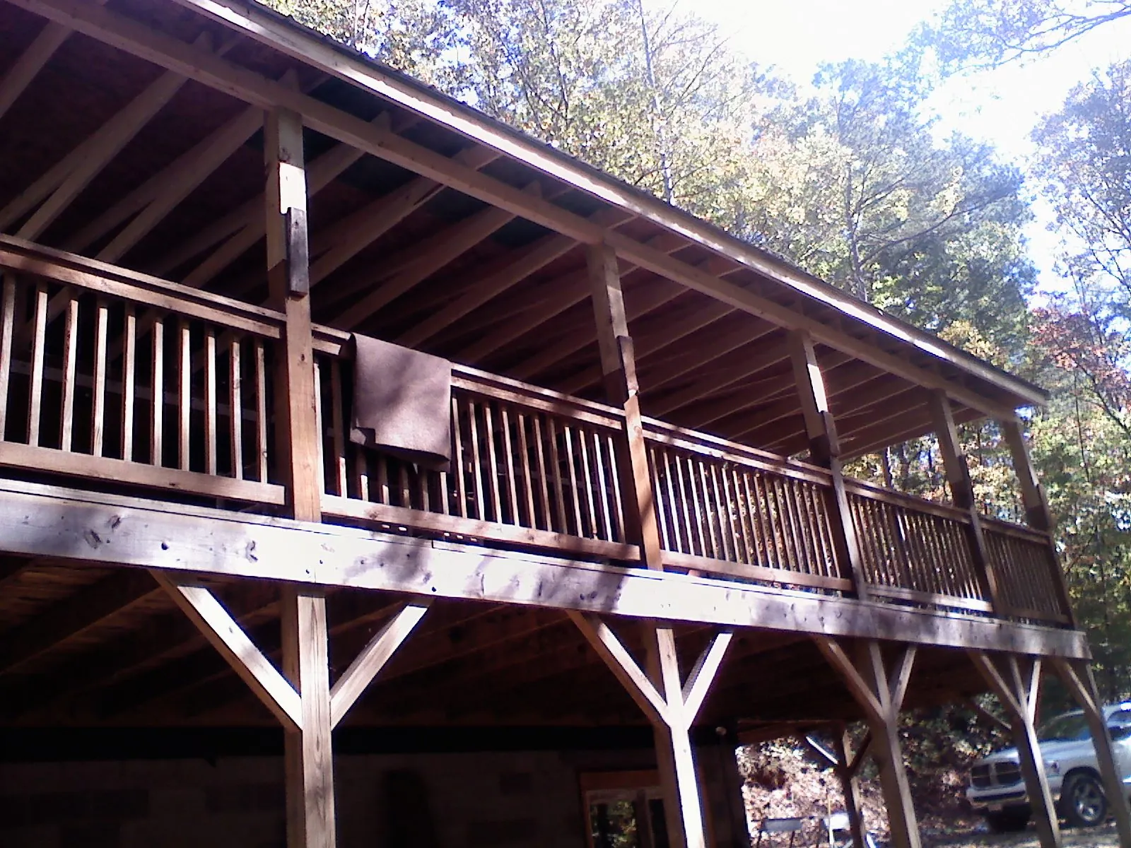 Timber framing under a new elevated porch and deck — Roof Leak Repair in Fenwick Island by Roofing Brothers